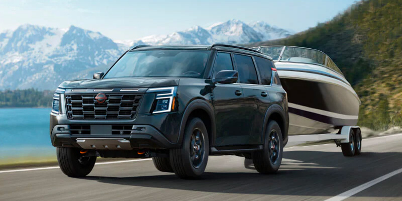 Road Trip Packing List - Nissan Armada towing a boat