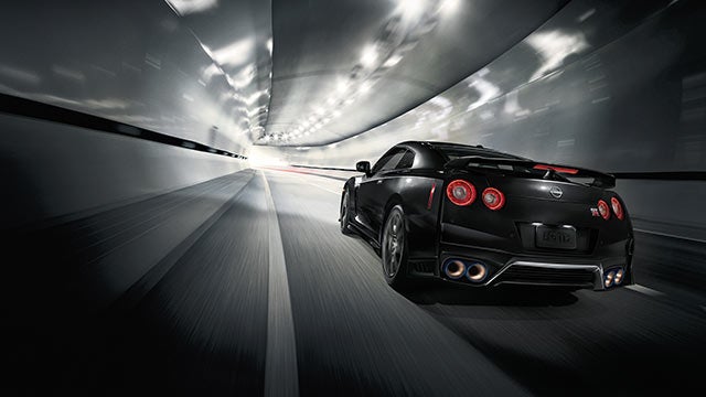 2023 Nissan GT-R seen from behind driving through a tunnel | All Star Nissan in Denham Springs LA